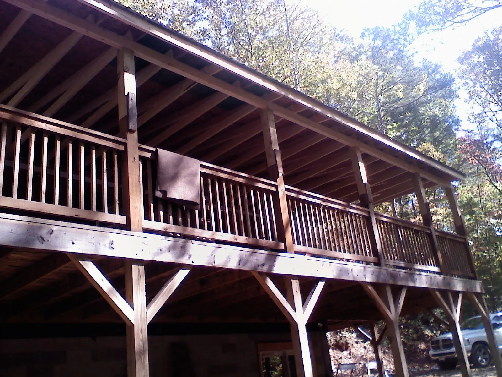 Timber framing under a new elevated porch and deck — Roof Leak Repair in West Newfield by Roofing Brothers